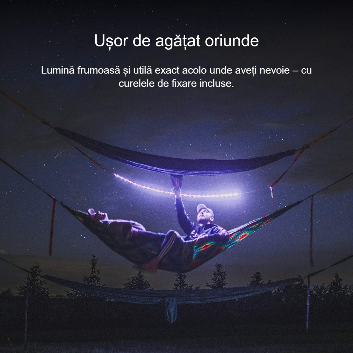 Bandă LED cu lumină mov agățată la camping