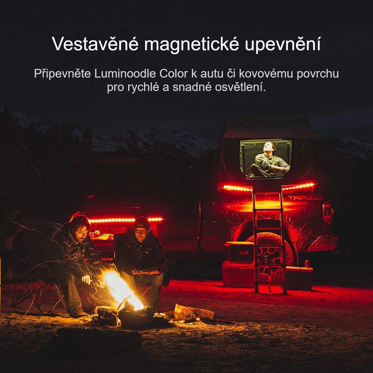 Červeně svítící LED pásek připevněný magnety k vozidlu