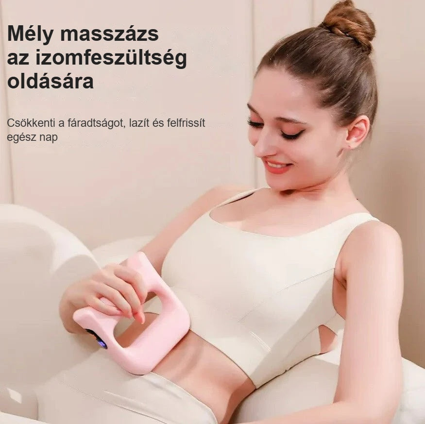 Nő pihen, hasán a vibrációs masszírozóval