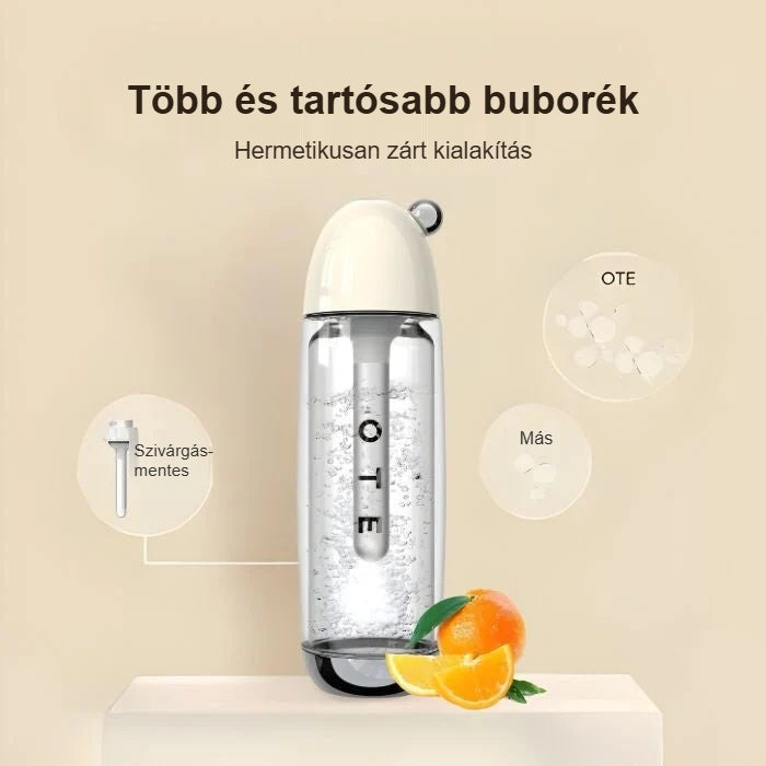 Szódakészítő gép hermetikusan zárt kialakítása, mellette narancs