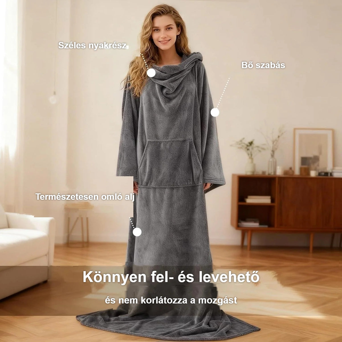 Álló nő szürke hordható plédben: széles nyakrész, hosszú ujjak