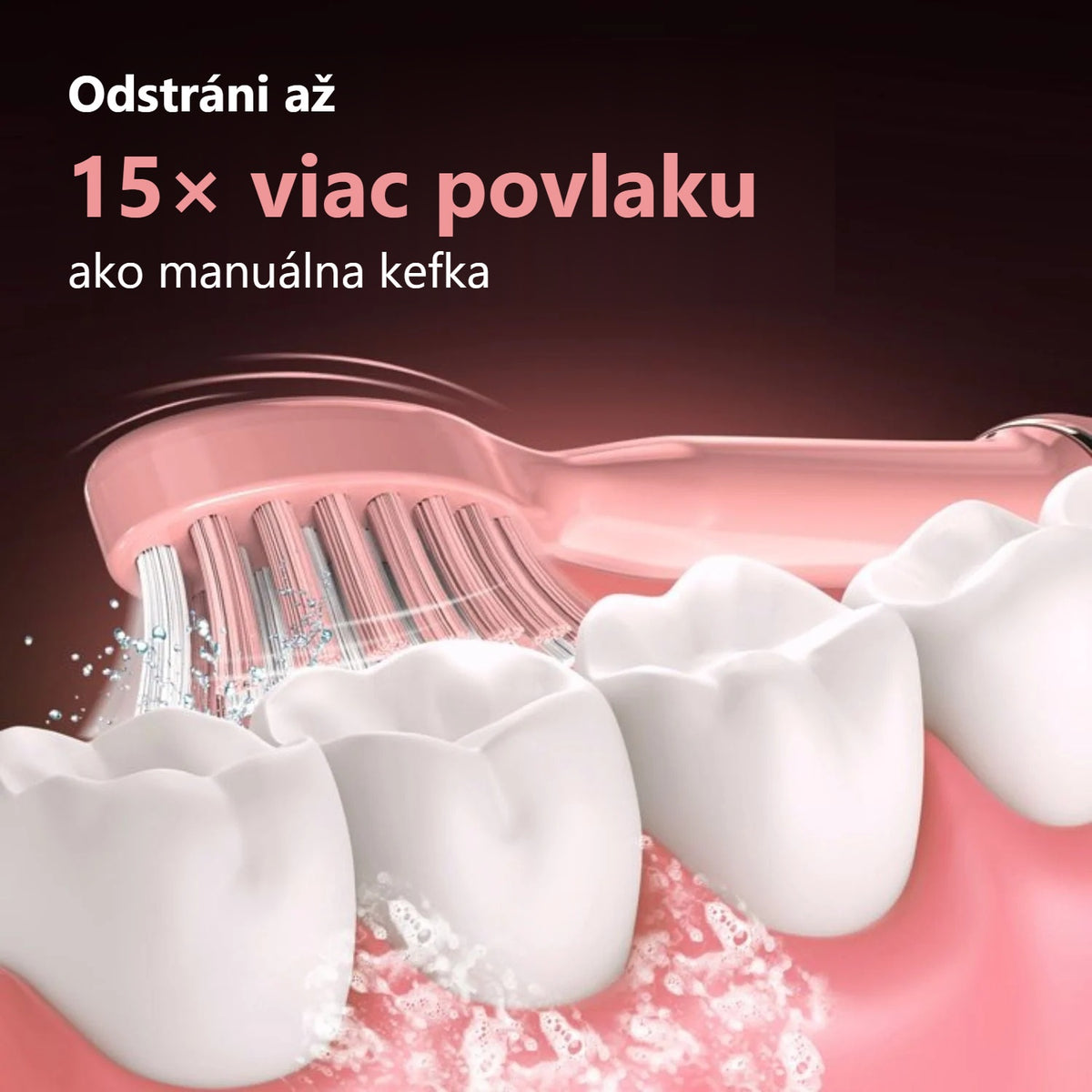 Ružová hlavica zubnej kefky na modeli zubov, ukážka odstránenia povlaku