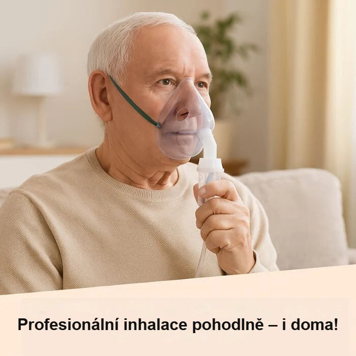 Starší muž inhaluje doma s maskou pro dospělé
