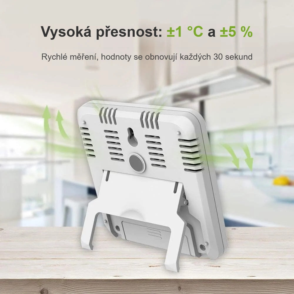 Zadní strana teploměru s větracími otvory a výklopnou nožkou