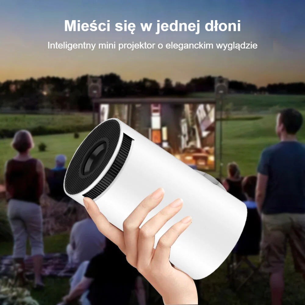 Kompaktowy mini projektor trzymany w jednej dłoni